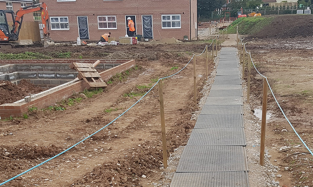 FastCover Keeps Housing Site Walkways Clean